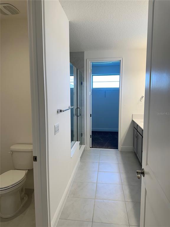 5282 Buttonsage Drive St. Cloud, FL 34772 - Photo 34 of 43 a bathroom with a toilet