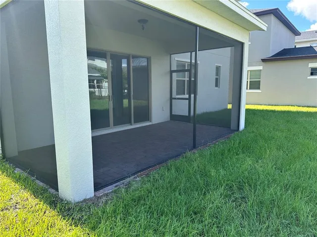 a view of a backyard of a house