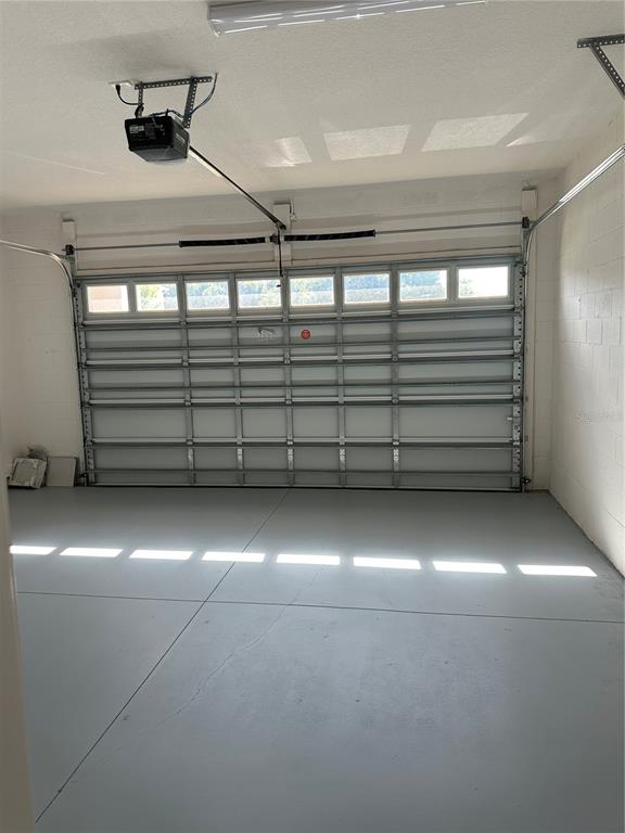 5282 Buttonsage Drive St. Cloud, FL 34772 - Photo 41 of 43 a view of a room with racks on the wall