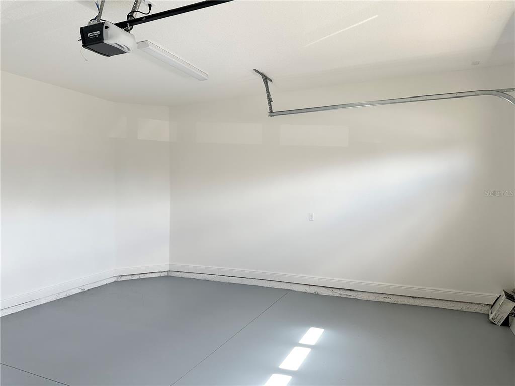 5282 Buttonsage Drive St. Cloud, FL 34772 - Photo 42 of 43 a view of a room with racks on the wall