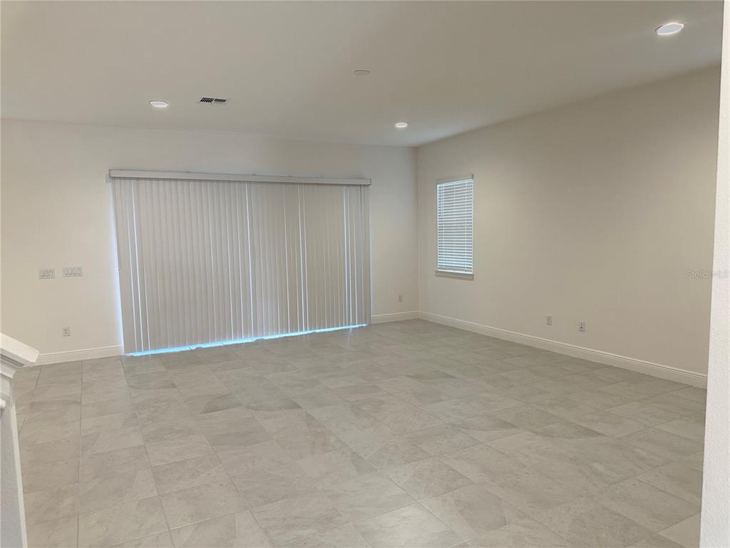 5282 Buttonsage Drive St. Cloud, FL 34772 - Photo 9 of 43 a view of an empty room