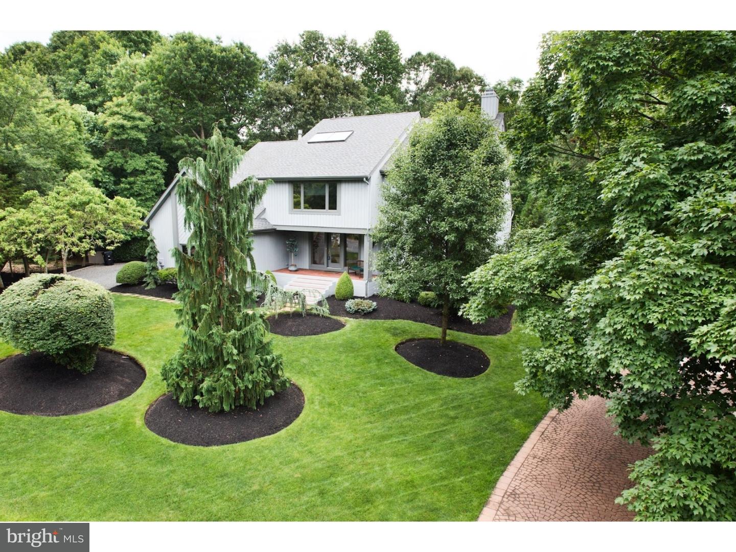 6 Rancocas Lane Medford, NJ 08055 - Photo 1 of 1 a view of a house with a yard and potted plants