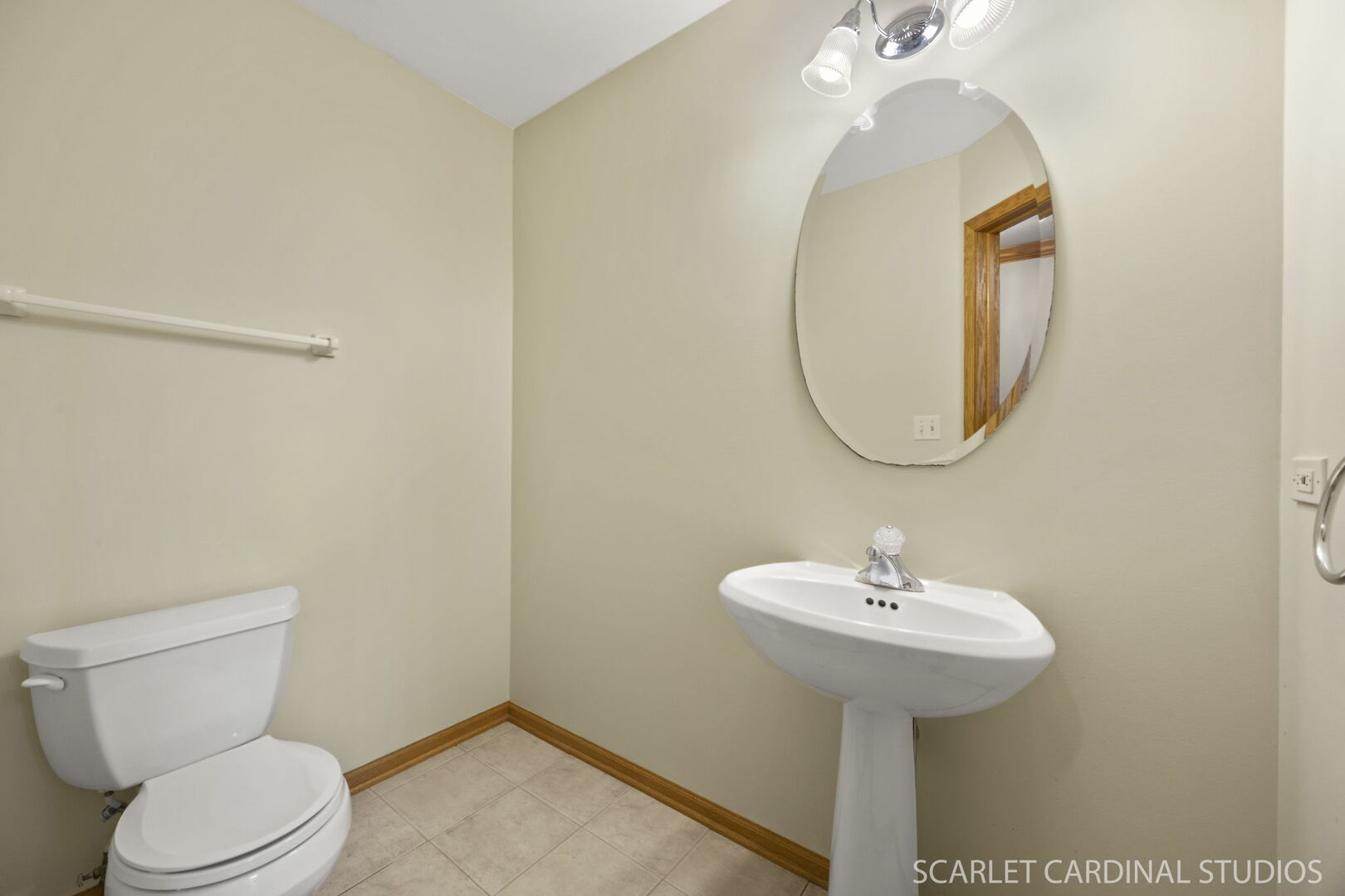 2242 Foxmoor Lane, Unit 2242 Aurora, IL 60502 - Photo 8 of 20 a bathroom with a sink a mirror and a toilet