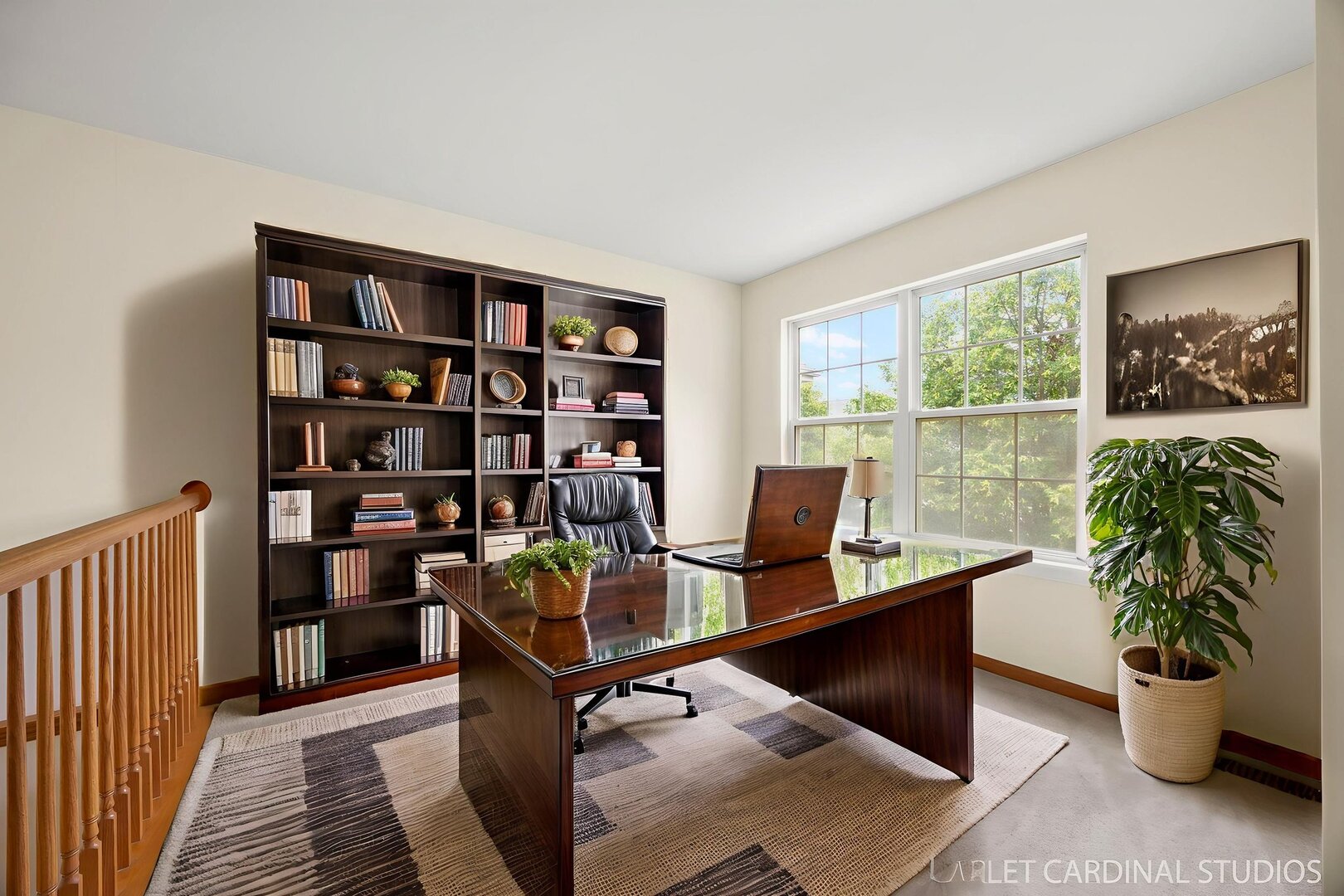 2242 Foxmoor Lane, Unit 2242 Aurora, IL 60502 - Photo 10 of 20 a view of a workspace with a bookshelf