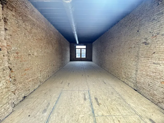 a view of a hallway with window