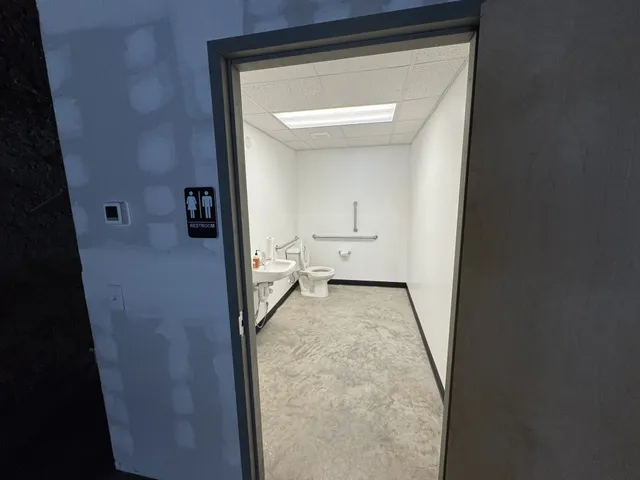 a view of a room that has a toilet in it