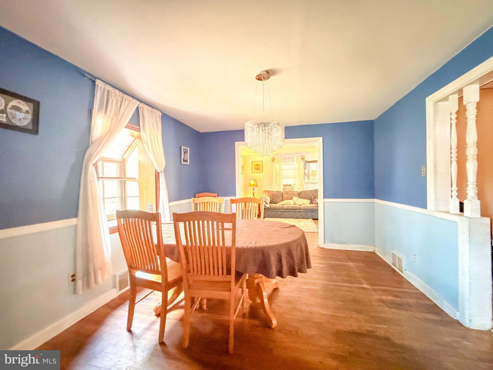 646 Amosland Road Morton, PA 19070 - Photo 4 of 11 Charming dining space with blue accents.