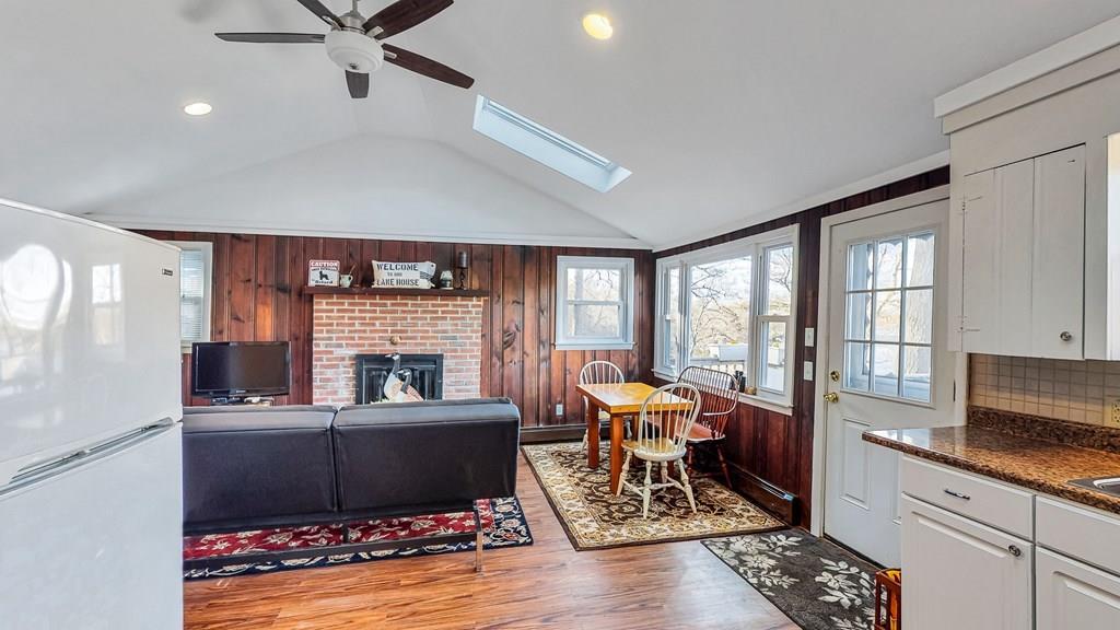 28 Stony Hill Road Holland, MA 01521 - Photo 11 of 27 a living room with furniture and a fireplace