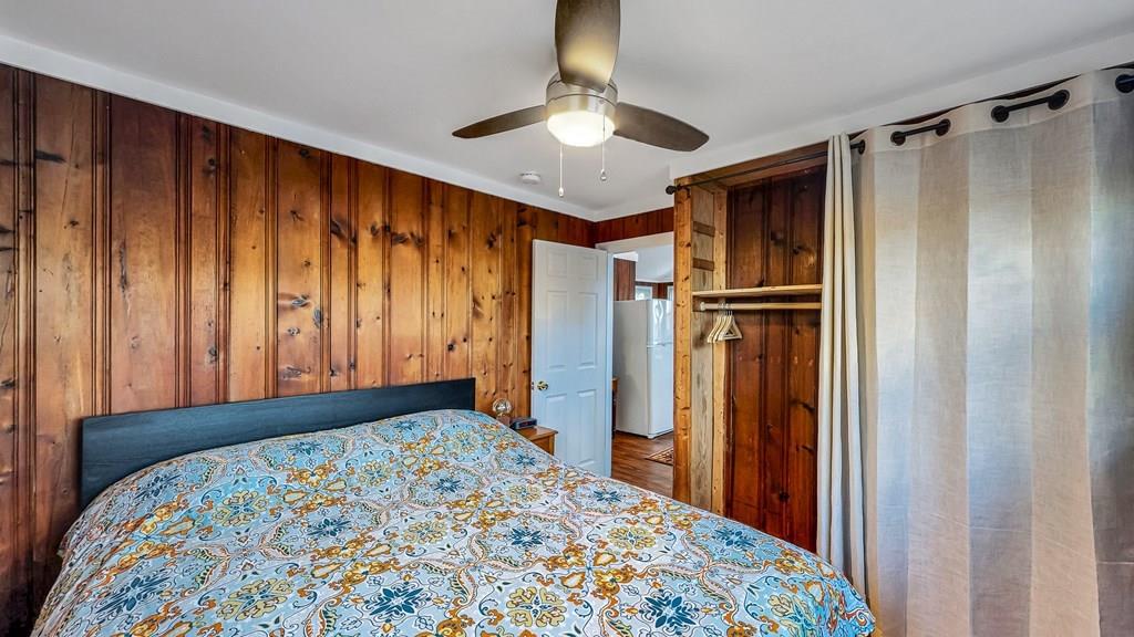 28 Stony Hill Road Holland, MA 01521 - Photo 13 of 27 a view of a bedroom with a bed and a dresser