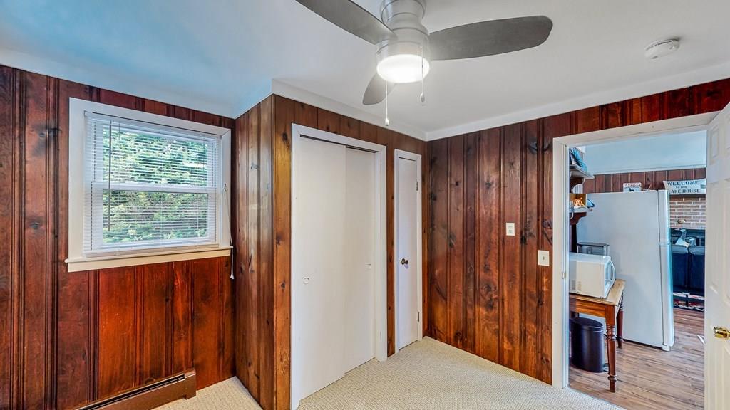 28 Stony Hill Road Holland, MA 01521 - Photo 16 of 27 a view of hallway with furniture and a chandelier fan