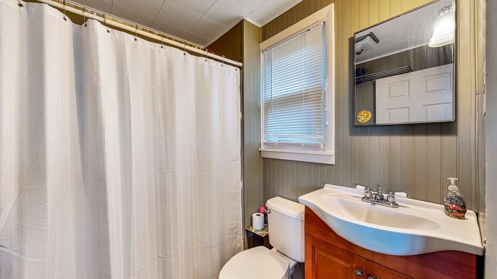 28 Stony Hill Road Holland, MA 01521 - Photo 17 of 27 a bathroom with a sink a mirror and a toilet