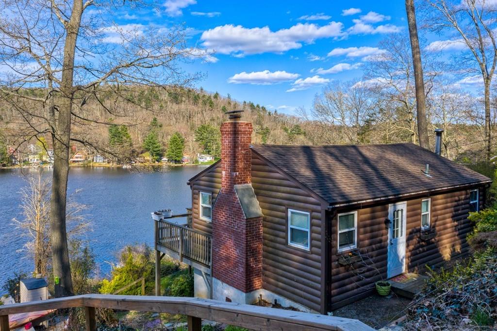 28 Stony Hill Road Holland, MA 01521 - Photo 2 of 27 a view of a house with a yard from a balcony