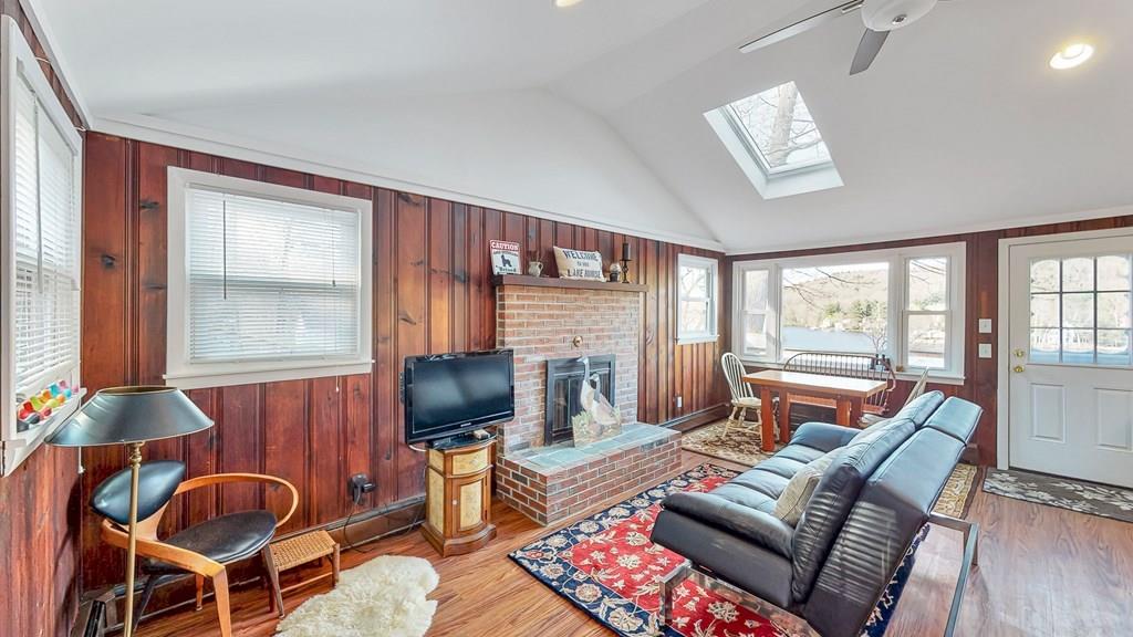 28 Stony Hill Road Holland, MA 01521 - Photo 3 of 27 a living room with furniture and a window