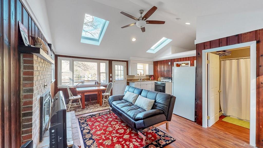 28 Stony Hill Road Holland, MA 01521 - Photo 4 of 27 a living room with furniture and a window