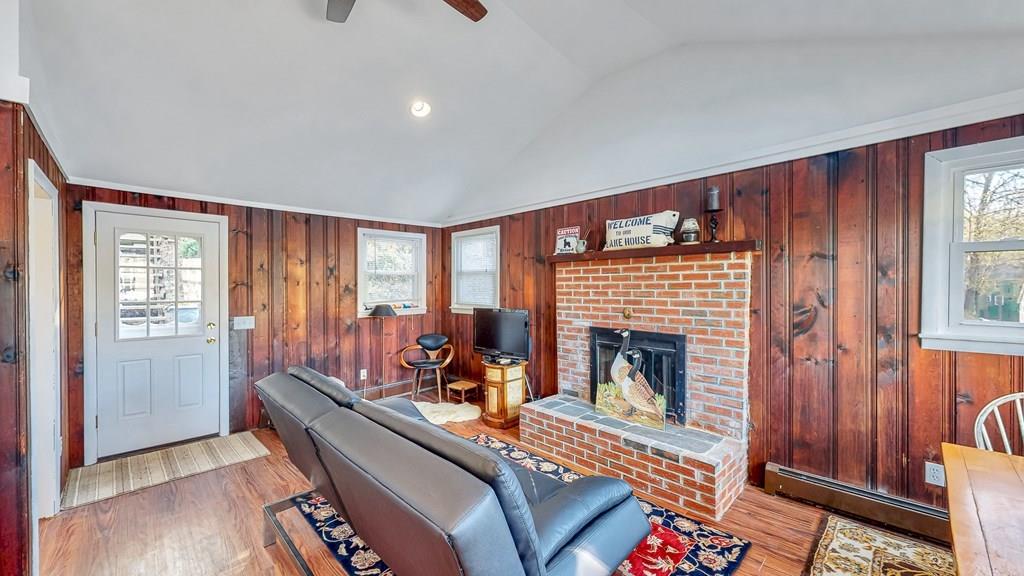 28 Stony Hill Road Holland, MA 01521 - Photo 10 of 27 a living room with furniture and a fireplace