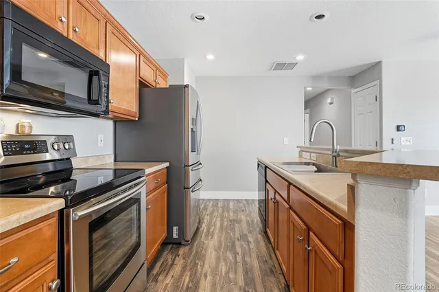 $295,000 | 11855 Oak Hill Way, Unit A, Commerce City, CO 80640