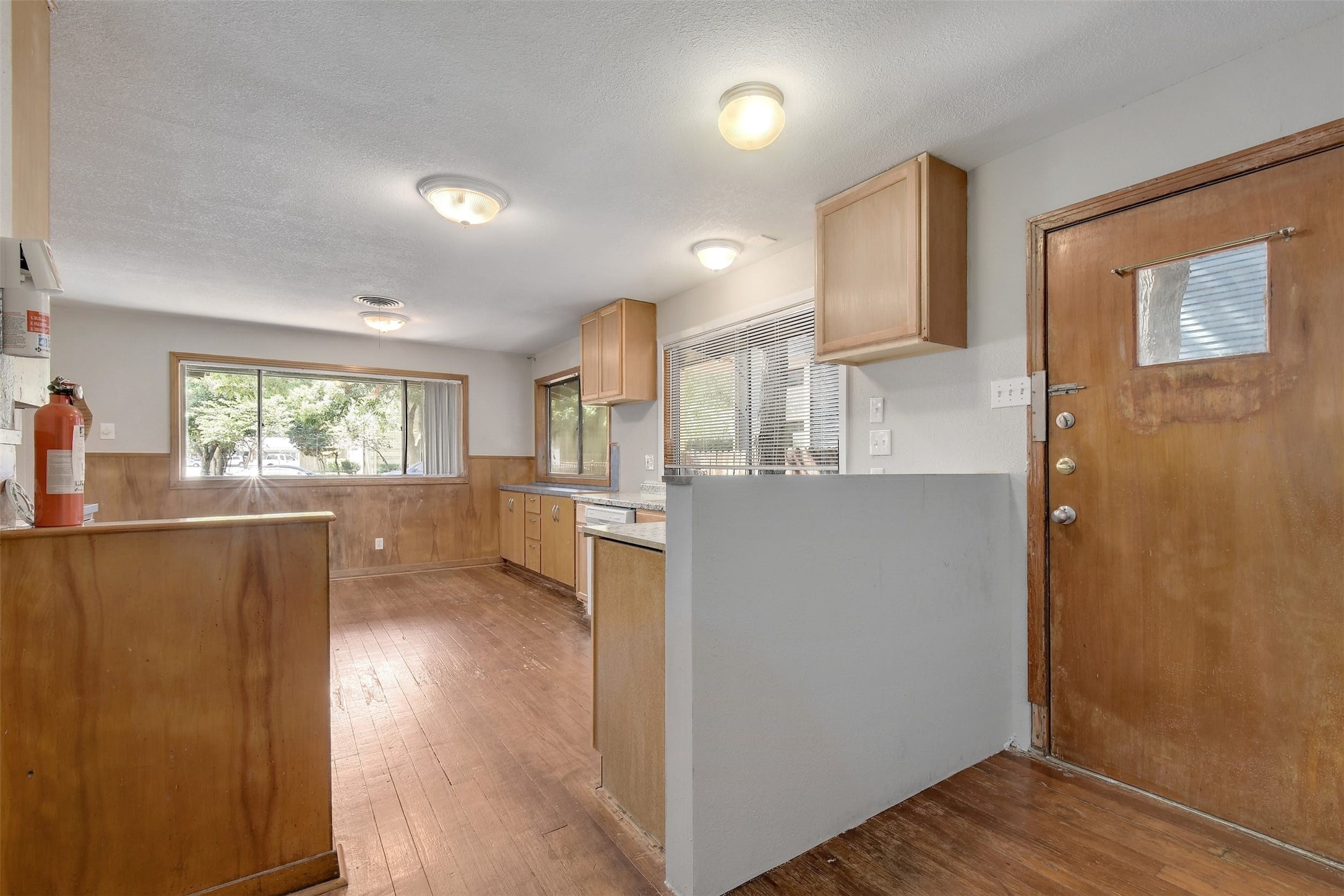 4306 Avenue B Austin, TX 78751 - Photo 13 of 34 a view of kitchen with livingroom and wooden floor
