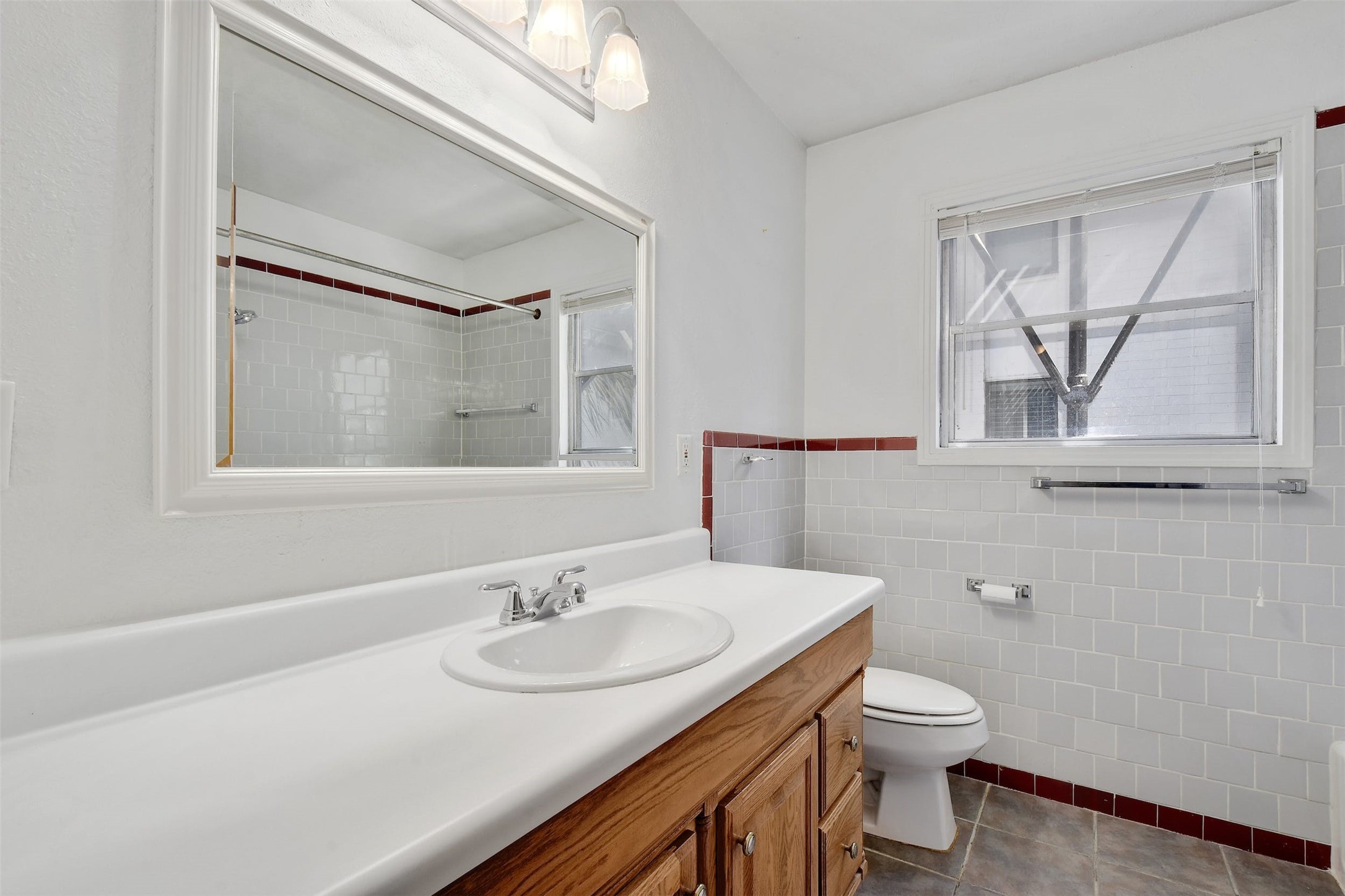 4306 Avenue B Austin, TX 78751 - Photo 25 of 34 a bathroom with a sink and a mirror