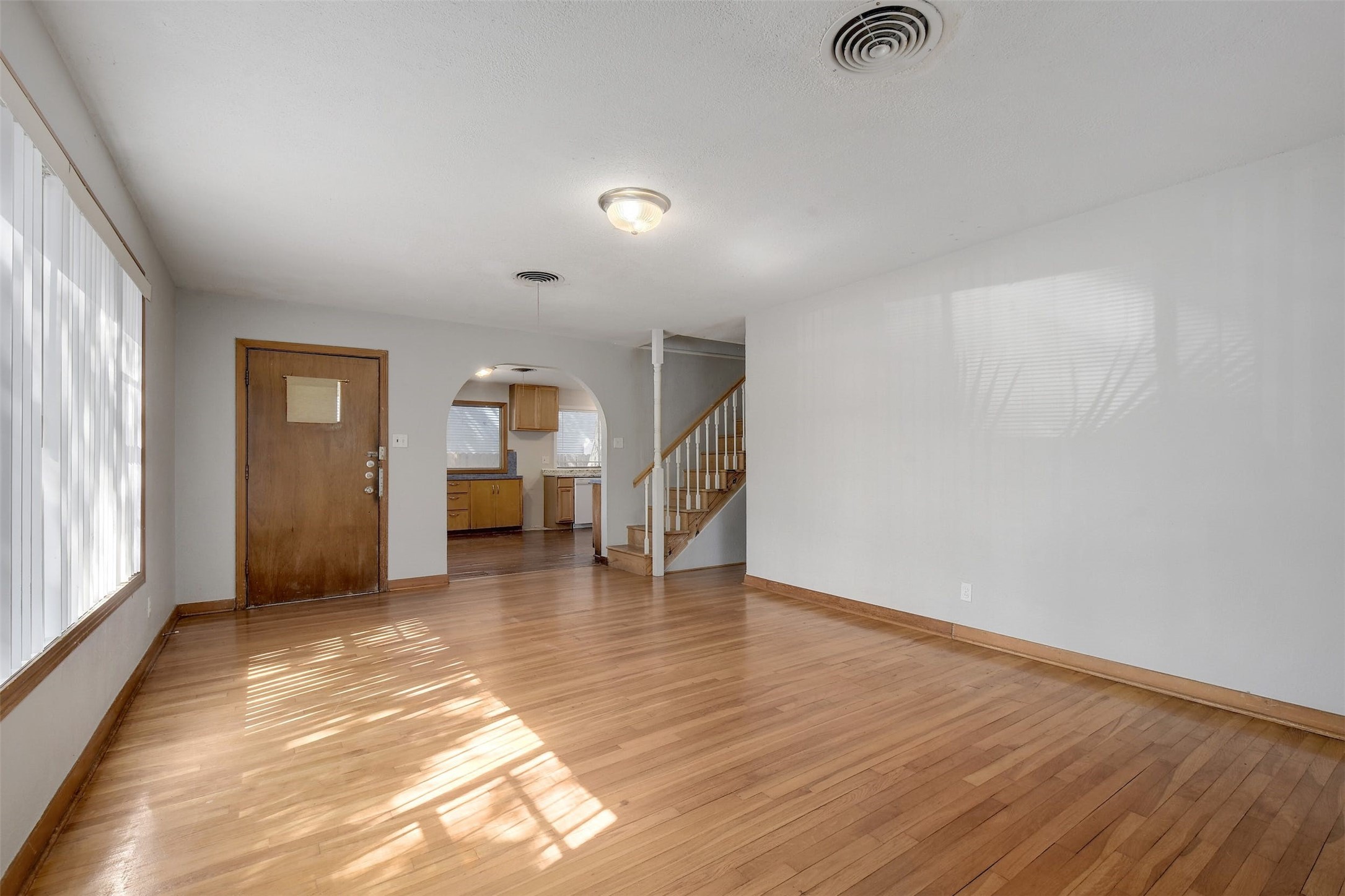 4306 Avenue B Austin, TX 78751 - Photo 3 of 34 a view of empty room with wooden floor