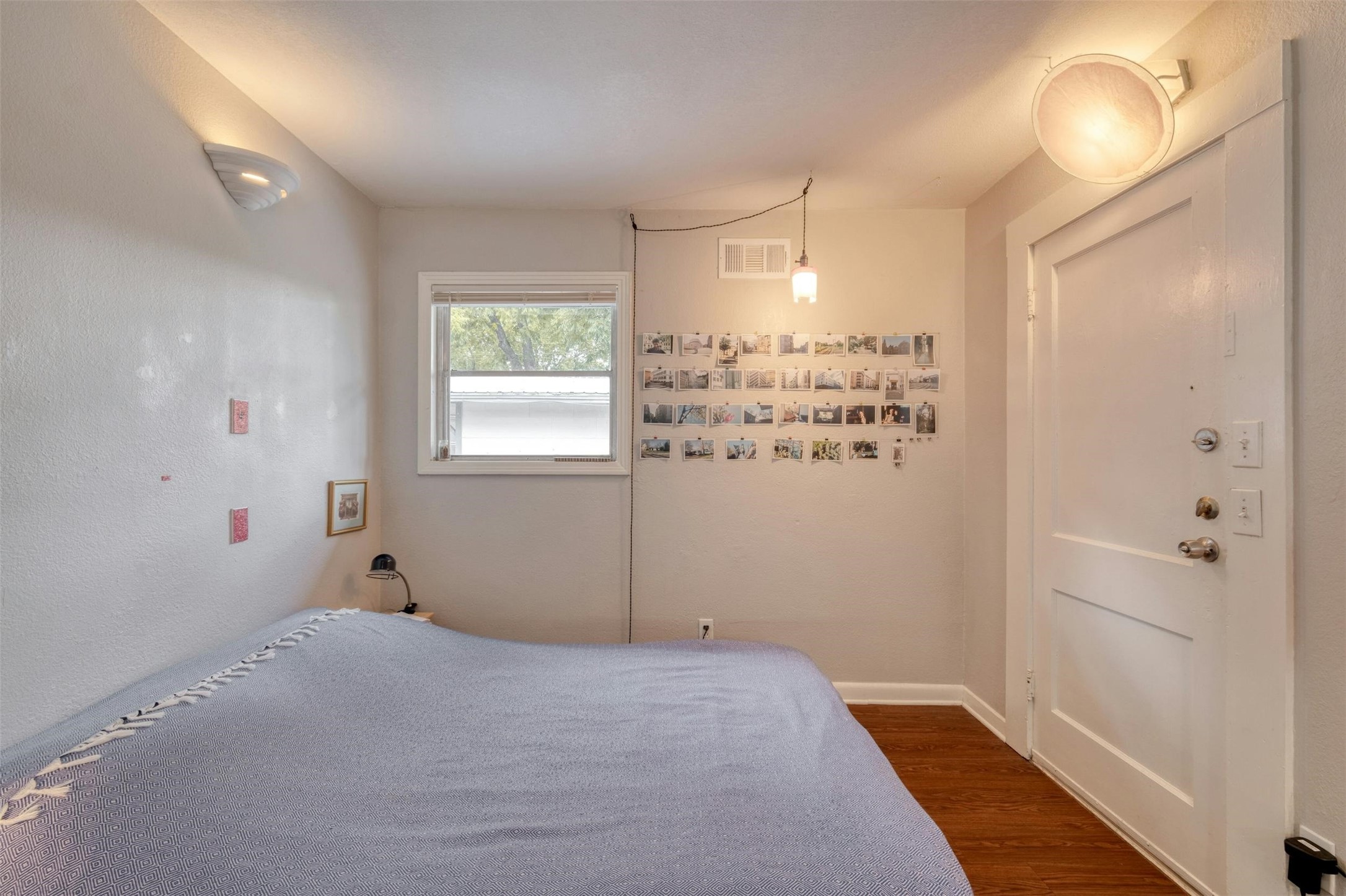 4306 Avenue B Austin, TX 78751 - Photo 31 of 34 a bedroom with a bed and a window