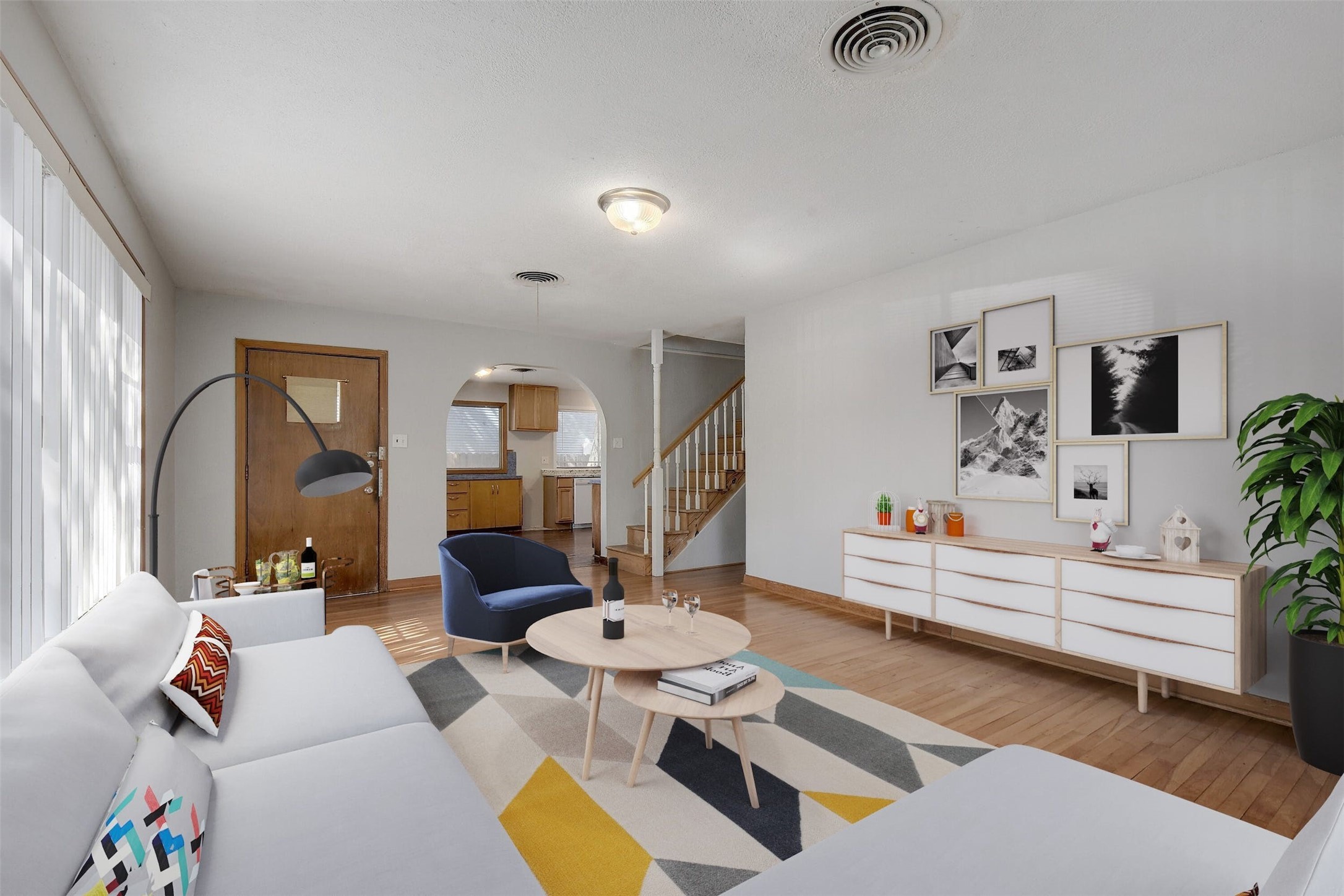 4306 Avenue B Austin, TX 78751 - Photo 4 of 34 a living room with furniture fireplace and a large window