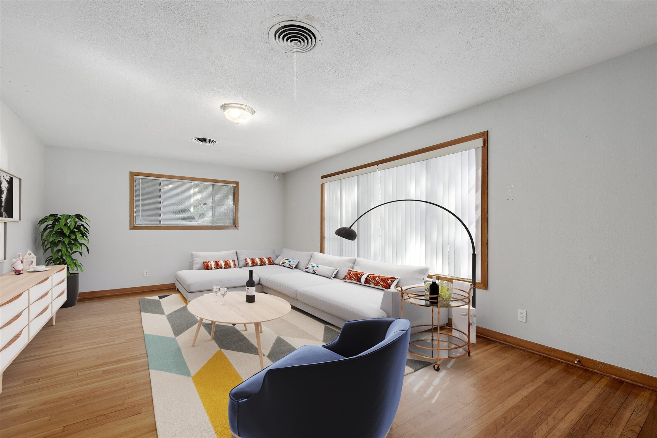 4306 Avenue B Austin, TX 78751 - Photo 6 of 34 a living room with furniture and a potted plant