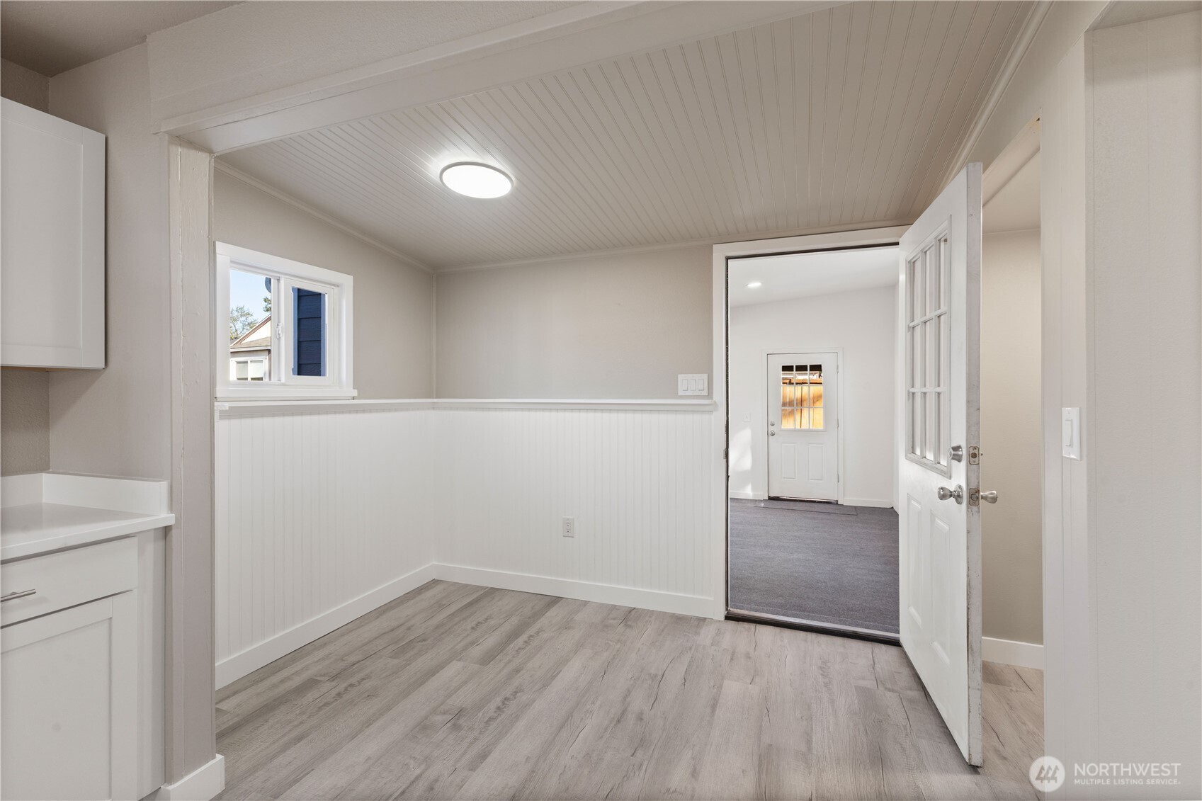639 Elizabeth Street Sumner, WA 98390 - Photo 12 of 26 an empty room with wooden floor and closet
