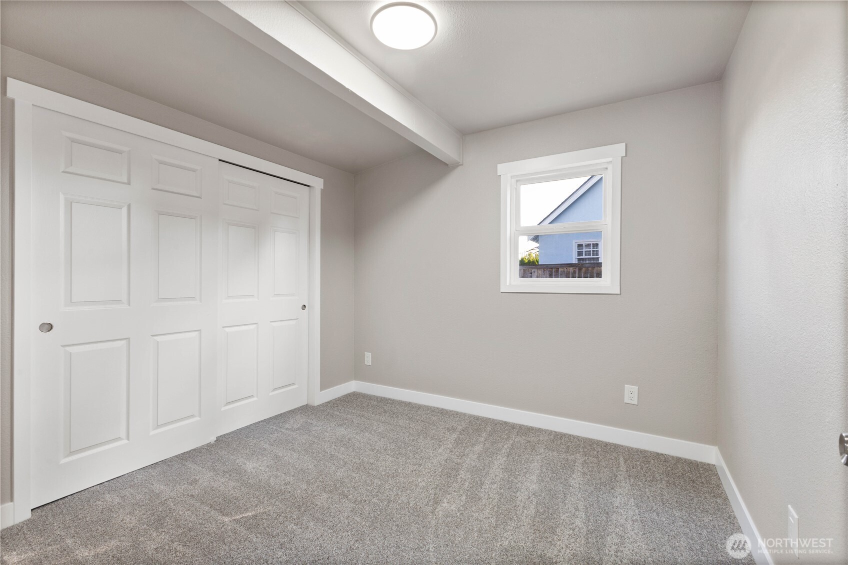 639 Elizabeth Street Sumner, WA 98390 - Photo 16 of 26 an empty room with windows and closet