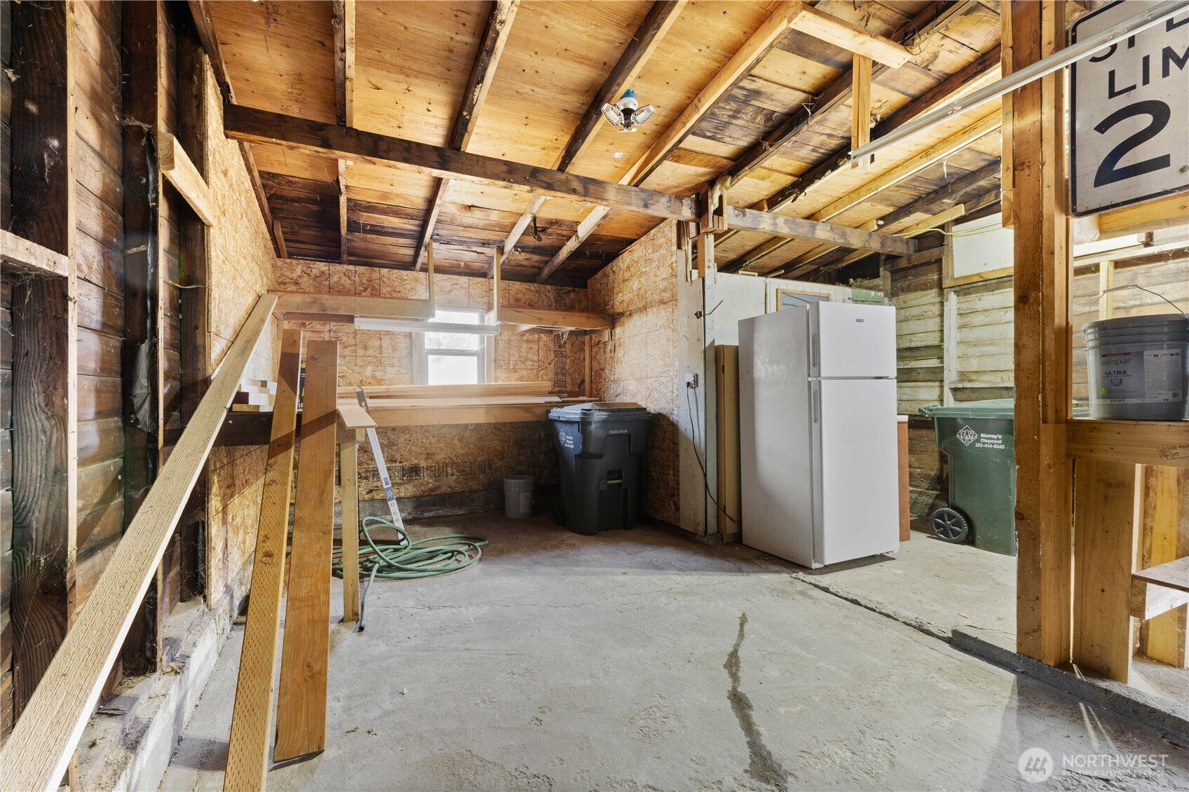 639 Elizabeth Street Sumner, WA 98390 - Photo 23 of 26 a view of an empty room with wooden floor