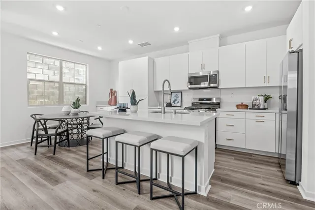 a view of a room with a large window