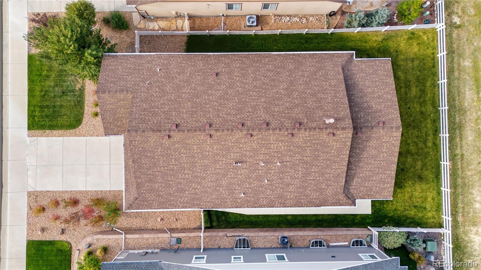 5740 Berry Ridge Wy. Castle Rock, CO 80104 - Photo 37 of 38 an aerial view of a house with a backyard