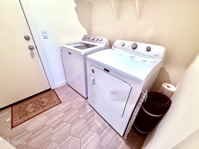 a utility room with dryer and washer