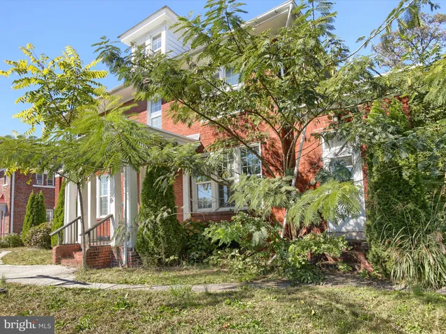 a view of balcony with a floor to ceiling window and wooden floor