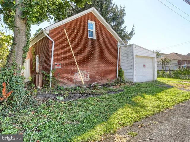 a picture of a bathroom with a shower
