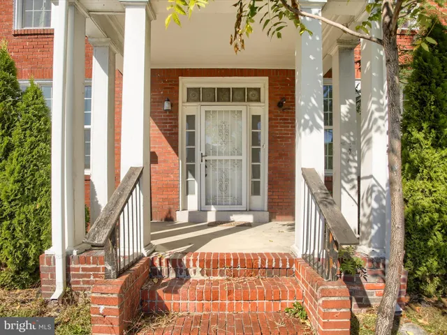 a living room with furniture and windows