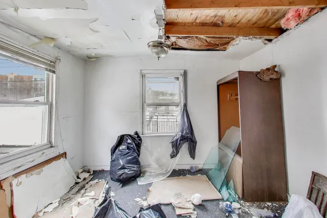 a room with furniture and wooden floor