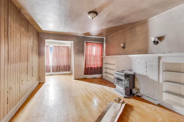 a view of a livingroom with natural light