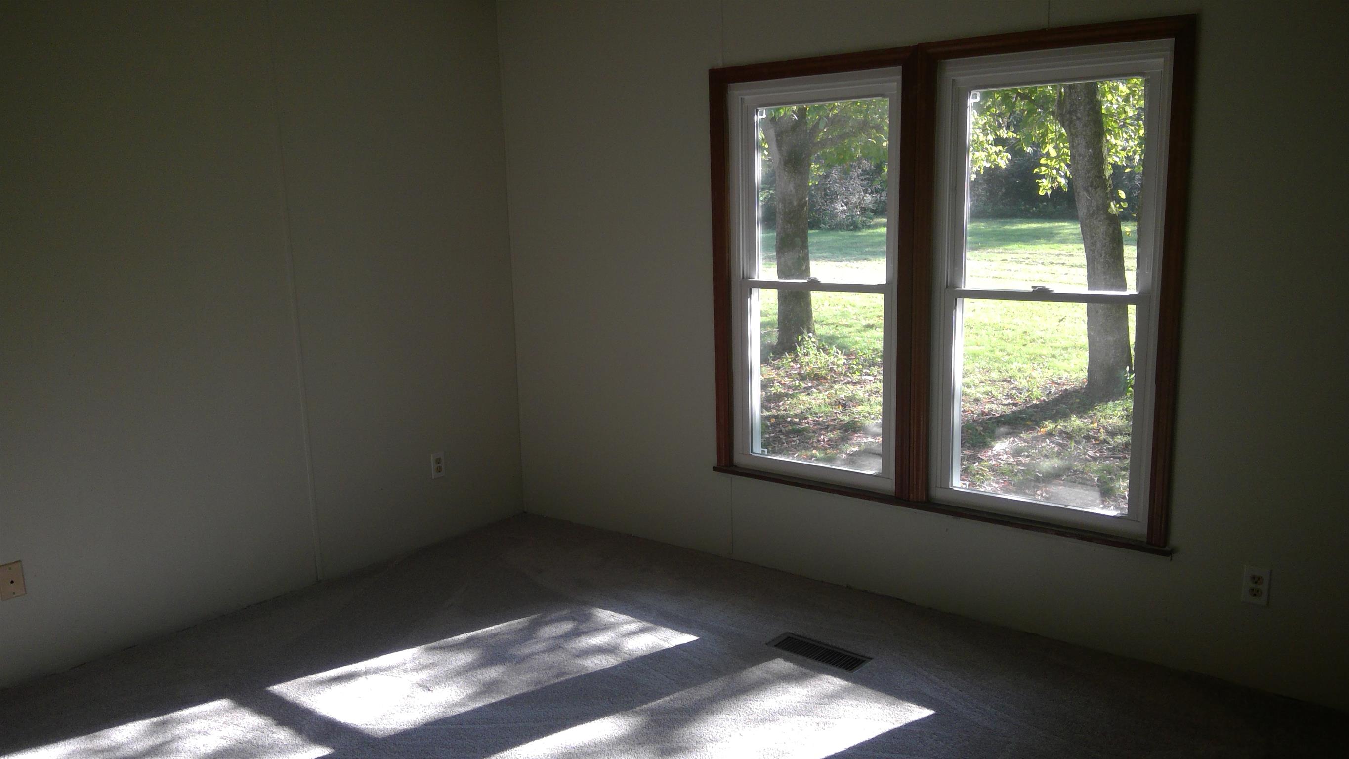 650 Canaan Road Columbia, TN 38401 - Photo 10 of 12 a view of an empty room with a window