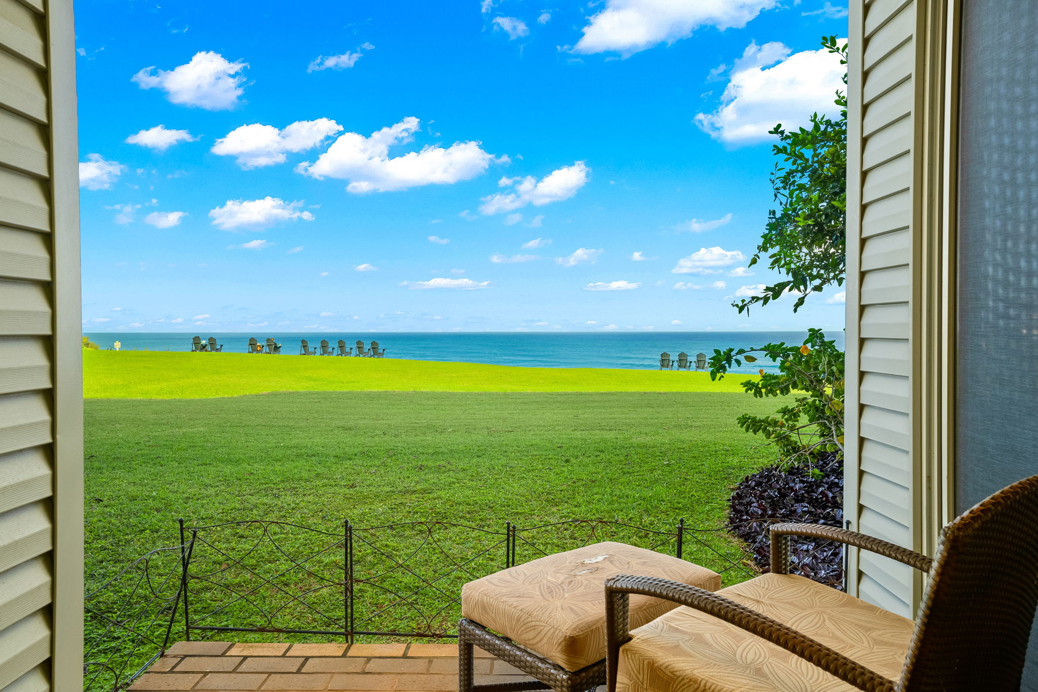 3811 Edward Road, Unit 8204 Princeville, HI 96722 - Photo 15 of 29 a view of a golf course with chairs