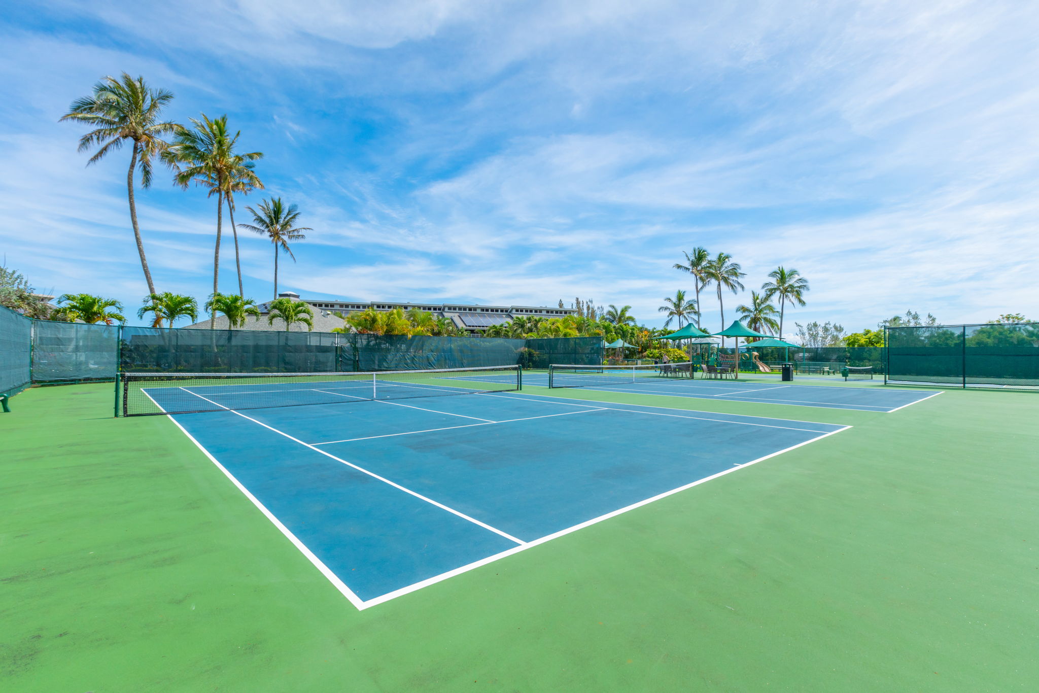 3811 Edward Road, Unit 8204 Princeville, HI 96722 - Photo 25 of 29 a view of a tennis court