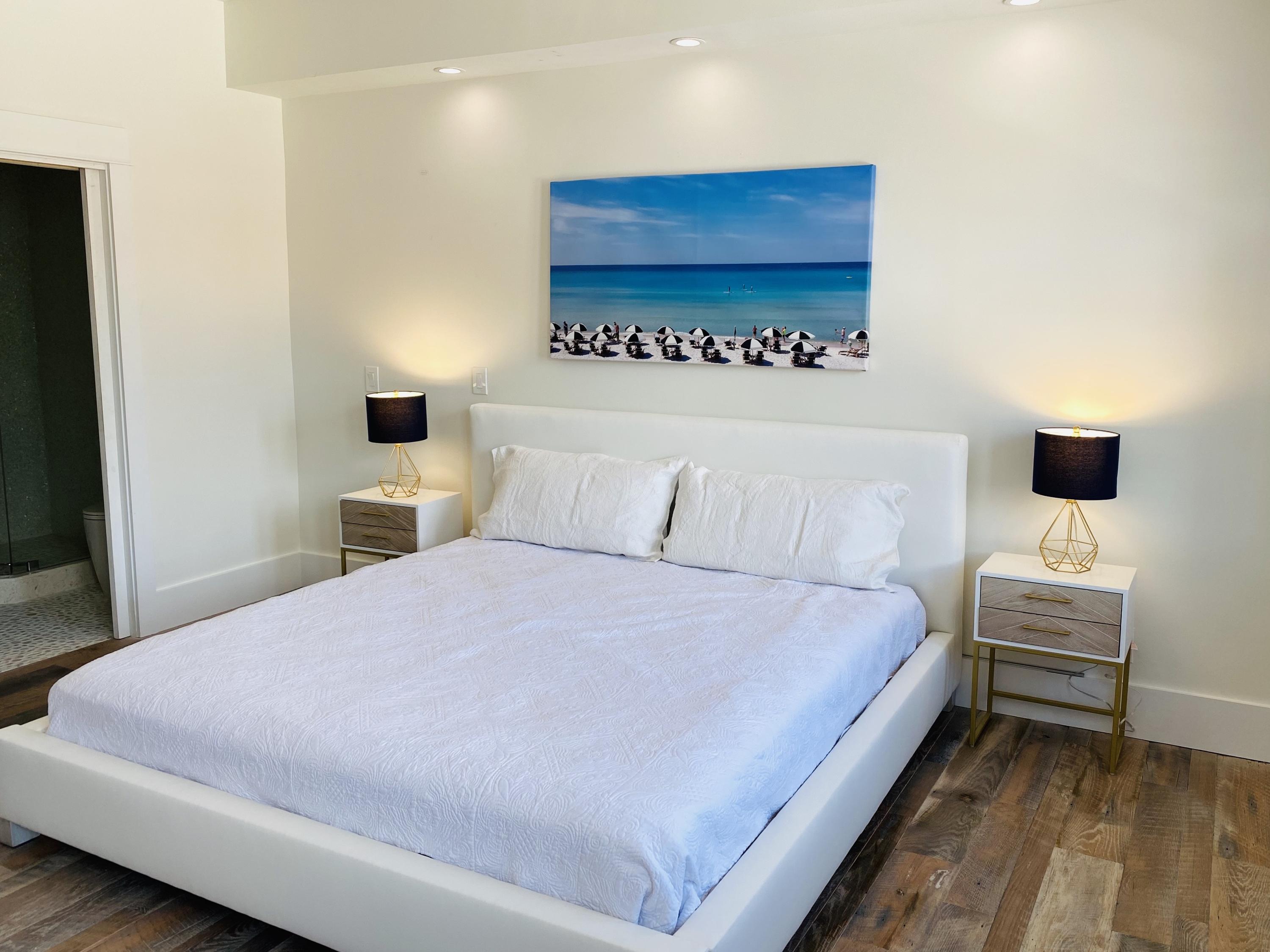 72 Main Street, Unit 2A Rosemary Beach, FL 32461 - Photo 7 of 7 a bedroom with a bed and a night stand
