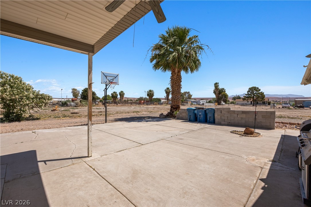 750 Leming Avenue Overton, NV 89040 - Photo 60 of 82 This spacious concrete patio offers ample outdoor living space, perfect for recreation and relaxation.