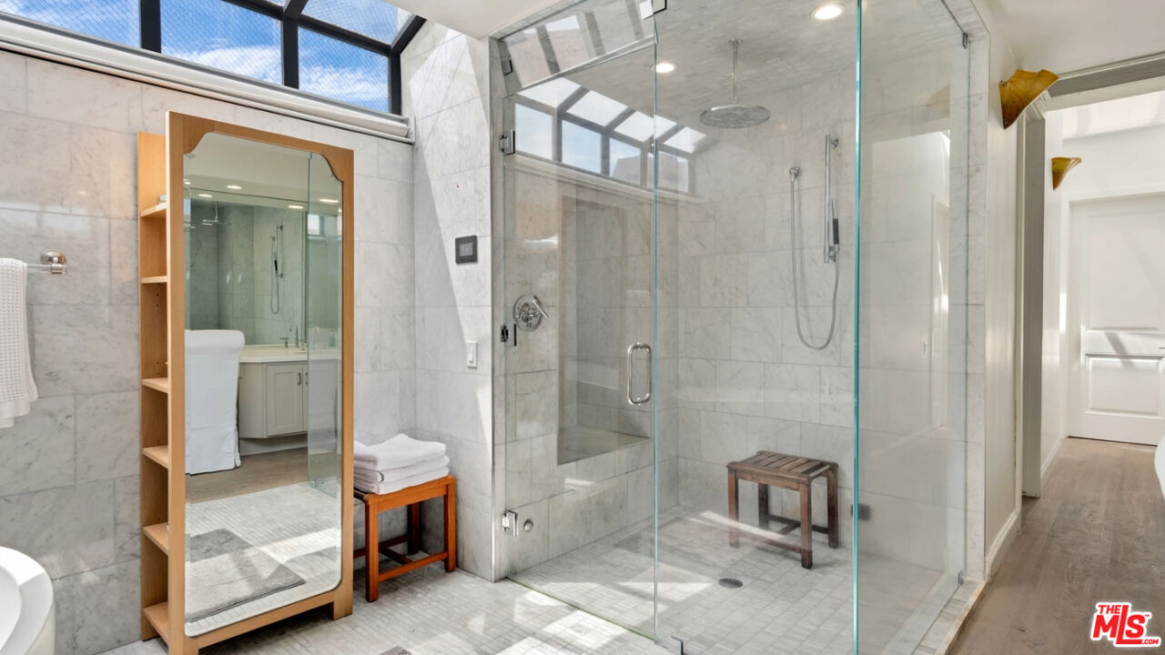 25252 Malibu Road, Unit UPPR Malibu, CA 90265 - Photo 7 of 27 a bathroom with a tub and shower