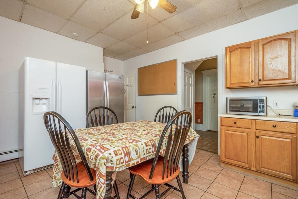 67 Congress Street Fitchburg, MA 01420 - Photo 12 of 39 a dining room with furniture and chandelier