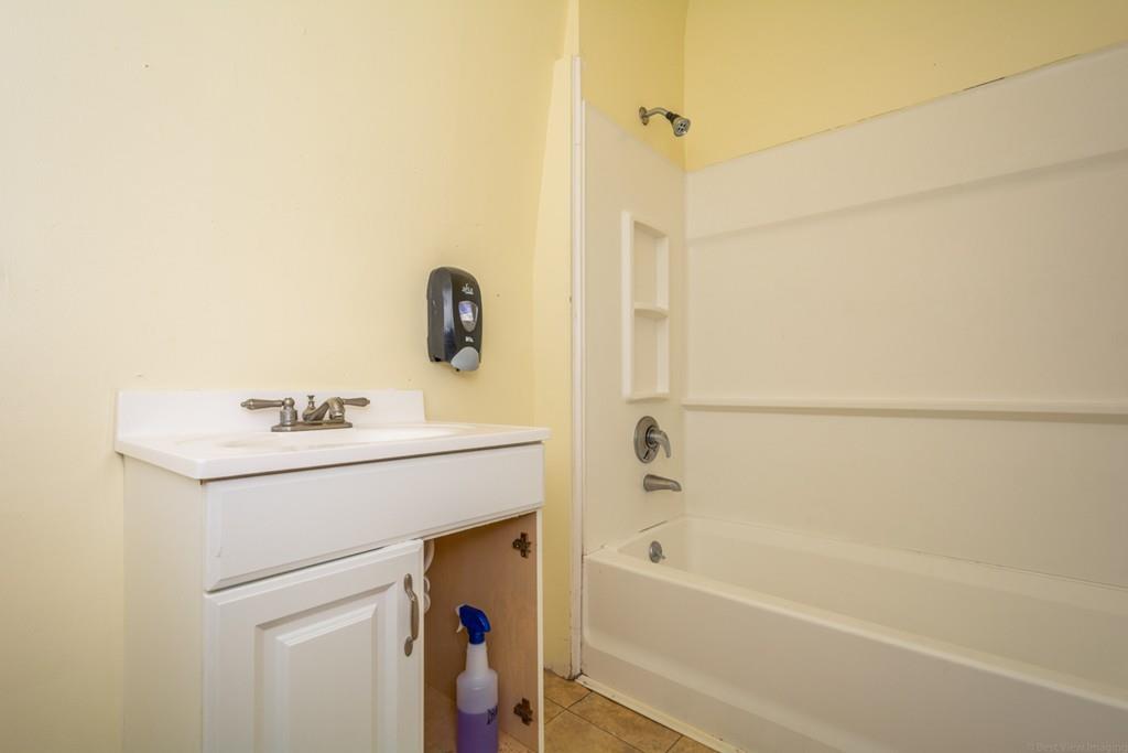 67 Congress Street Fitchburg, MA 01420 - Photo 22 of 39 a bathroom with a sink a bath tub and a shower