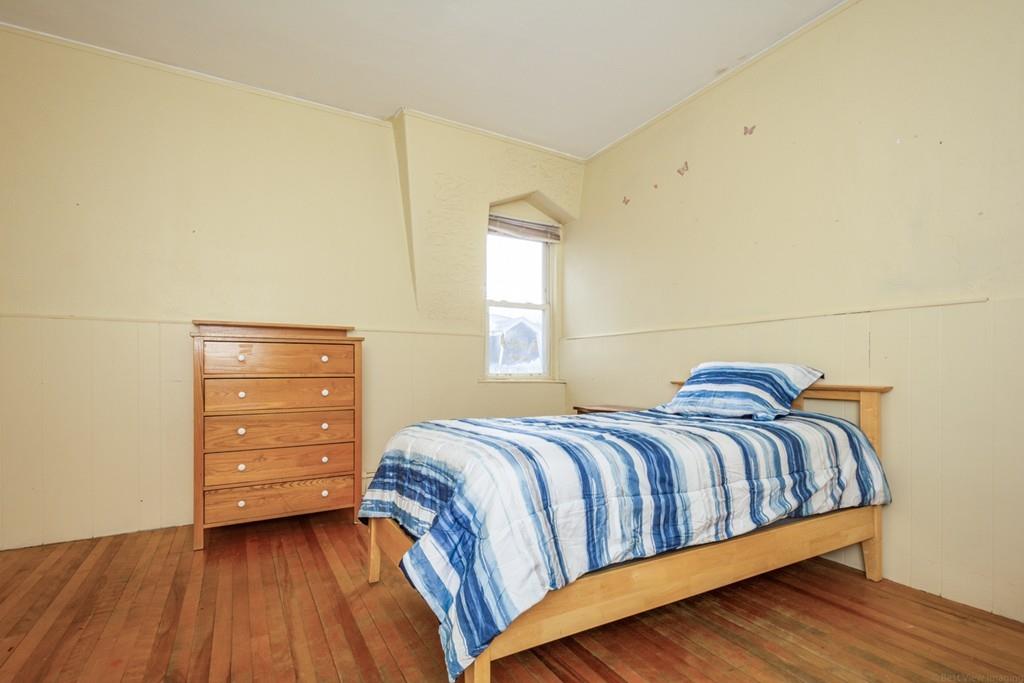 67 Congress Street Fitchburg, MA 01420 - Photo 23 of 39 a bedroom with a bed and a closet