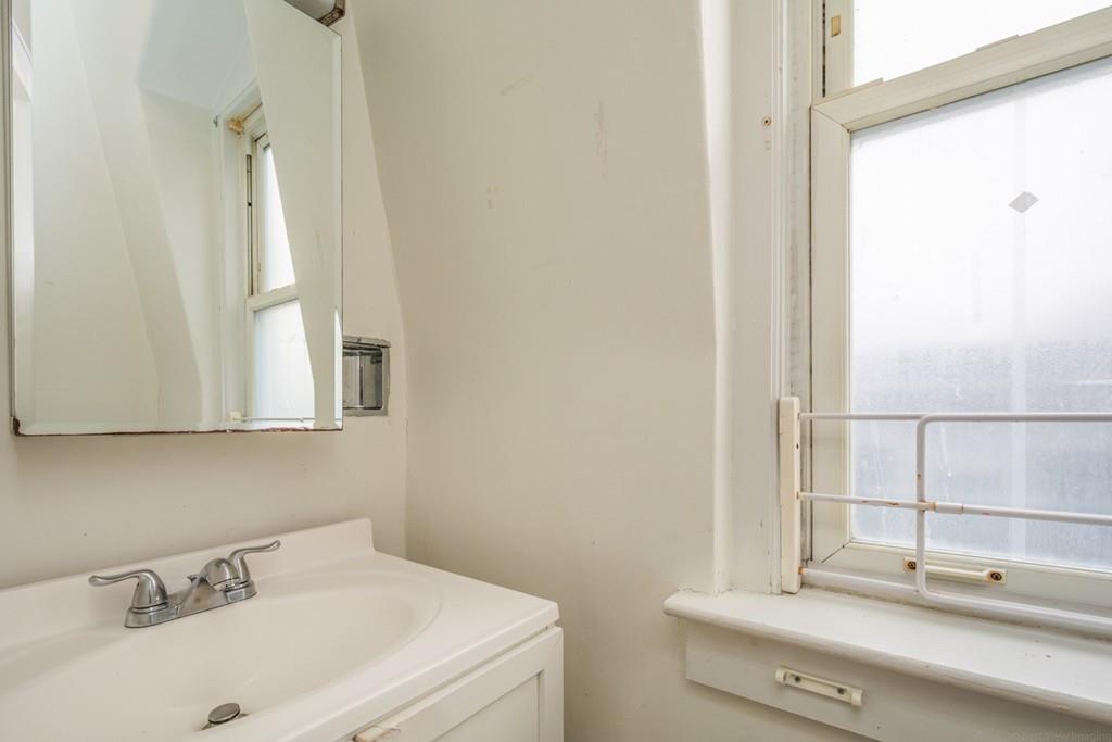 67 Congress Street Fitchburg, MA 01420 - Photo 26 of 39 a bathroom with a sink and a bathtub