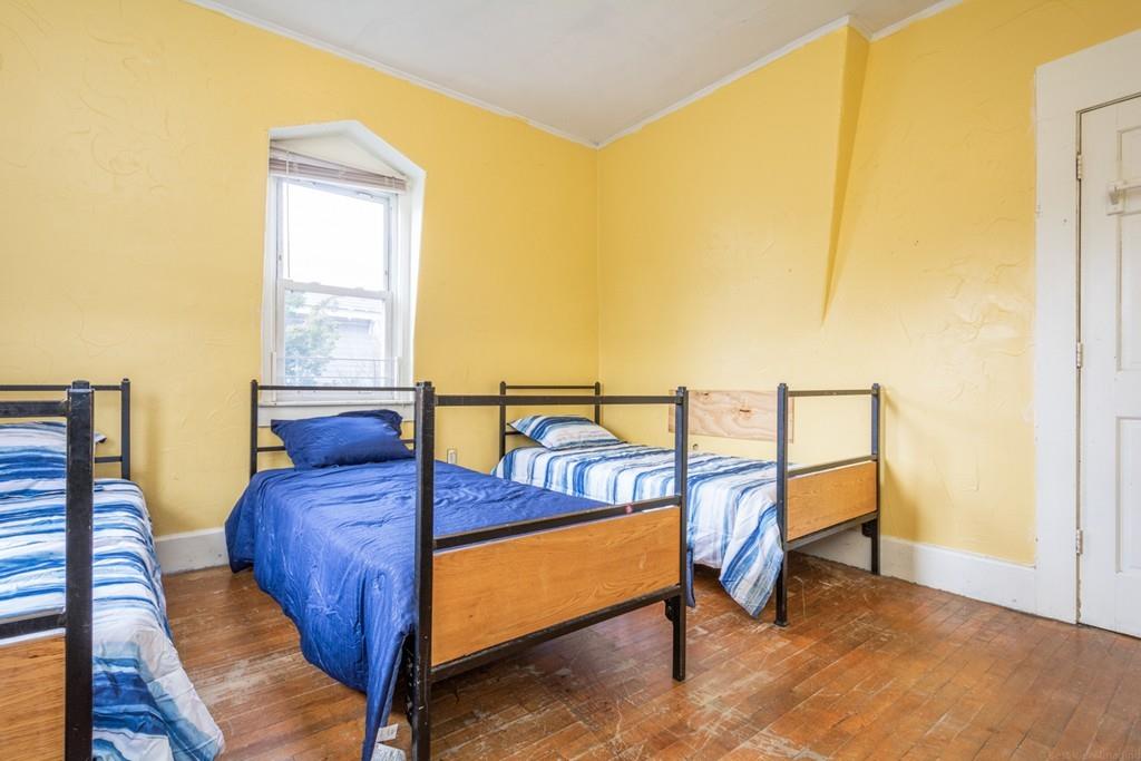 67 Congress Street Fitchburg, MA 01420 - Photo 34 of 39 a bedroom with furniture and a window