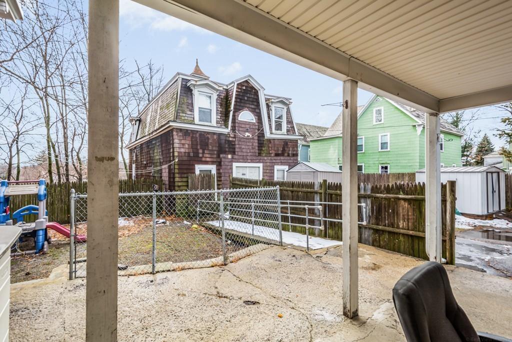 67 Congress Street Fitchburg, MA 01420 - Photo 37 of 39 a view of a house with a iron gate