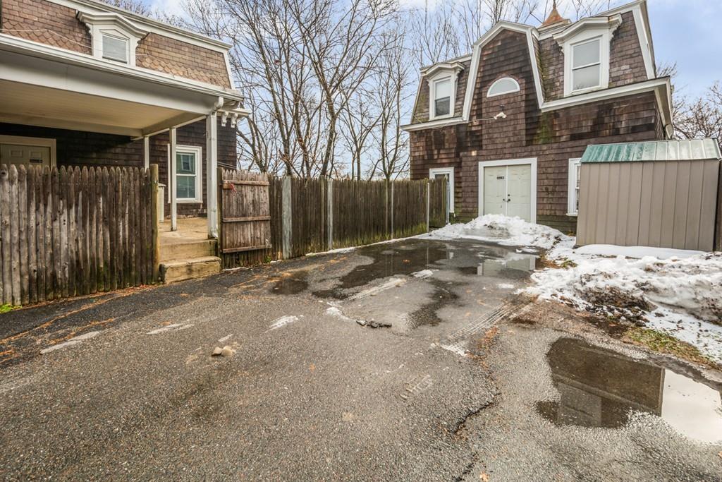 67 Congress Street Fitchburg, MA 01420 - Photo 38 of 39 a view of a house with a snow on the road